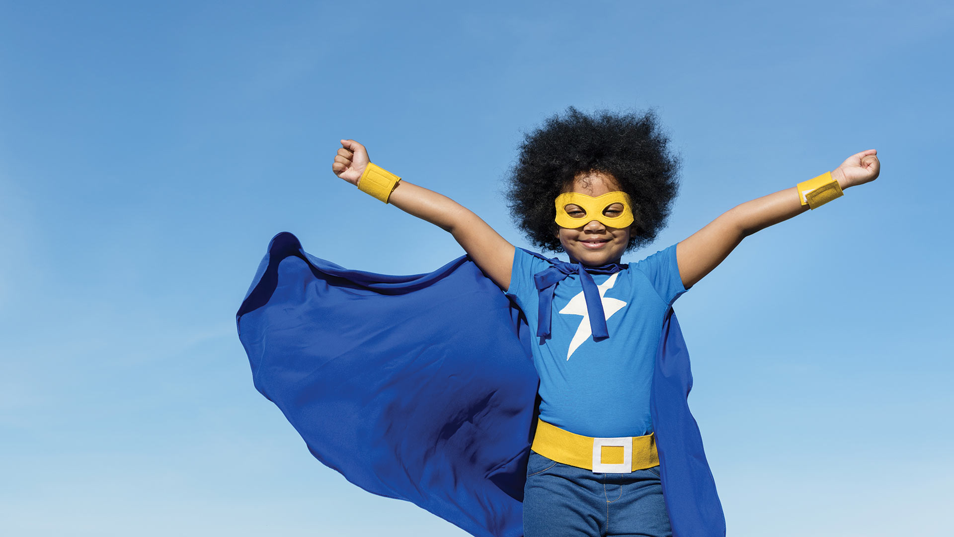 child dressed as a super hero