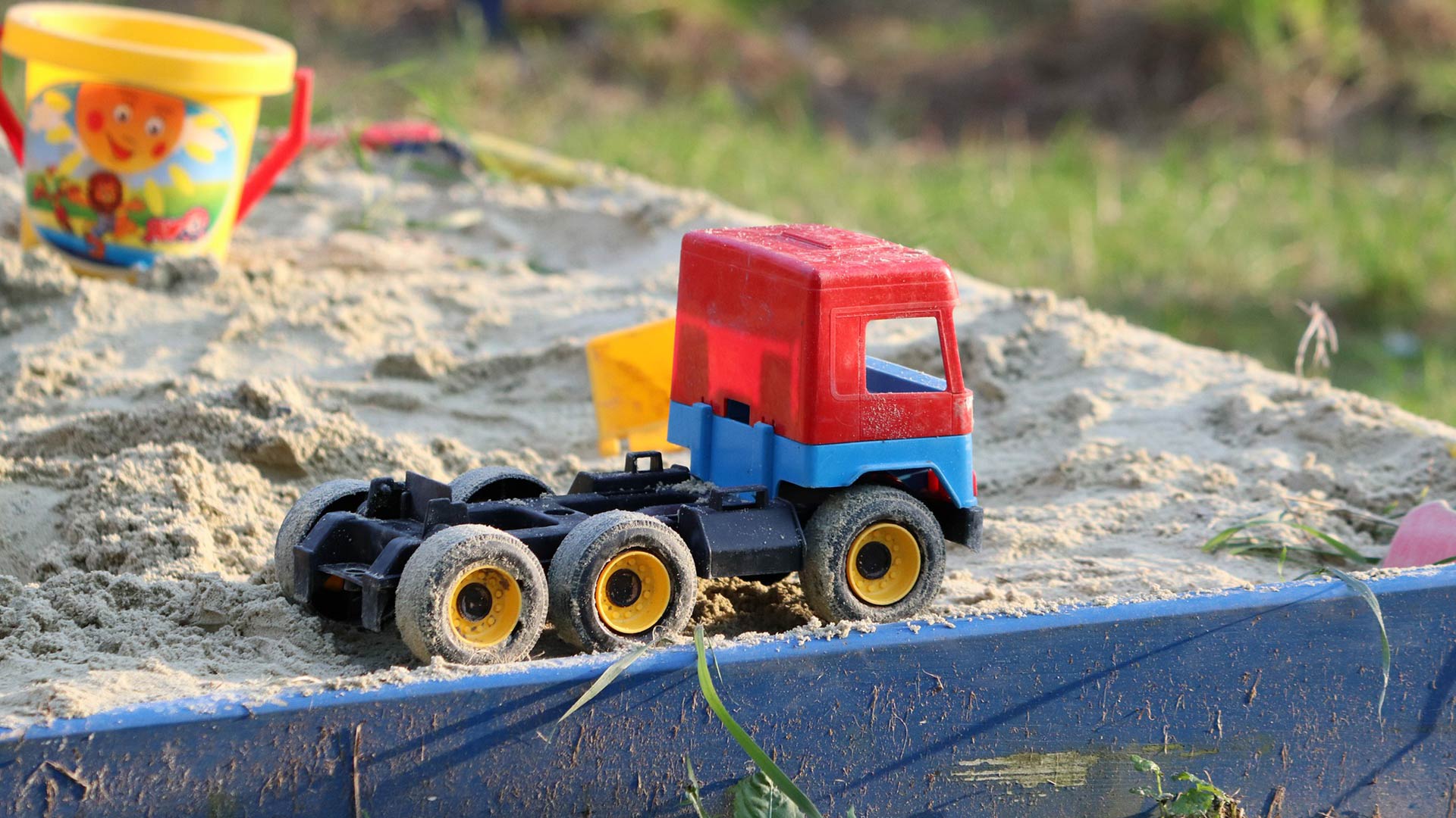 toys in sandbox