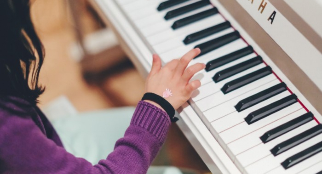 Child playing the piano