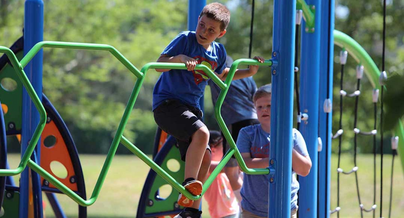 group of boys playing on a playground