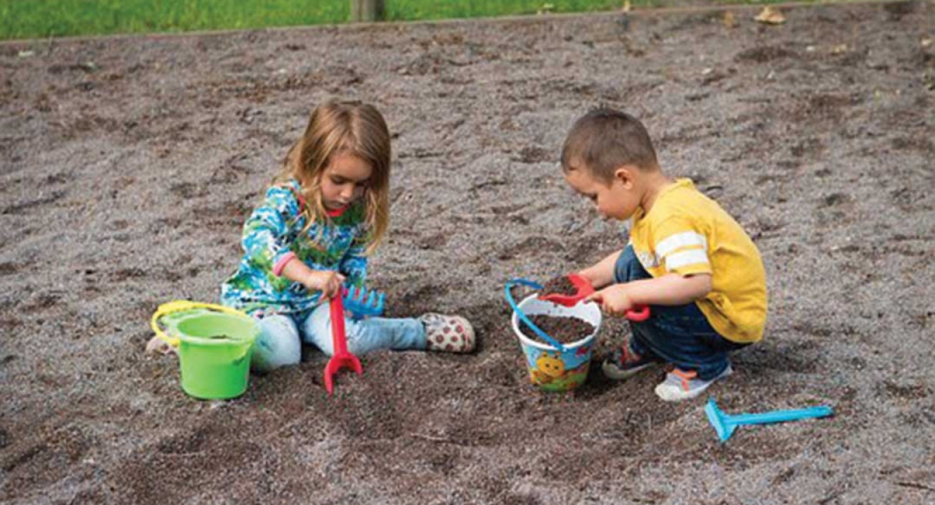 kids playing in a sanitary sand box