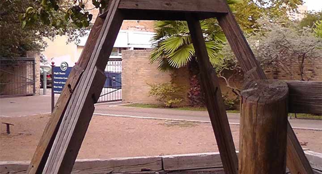Hemisfair Park Playground - frame with missing tire swing