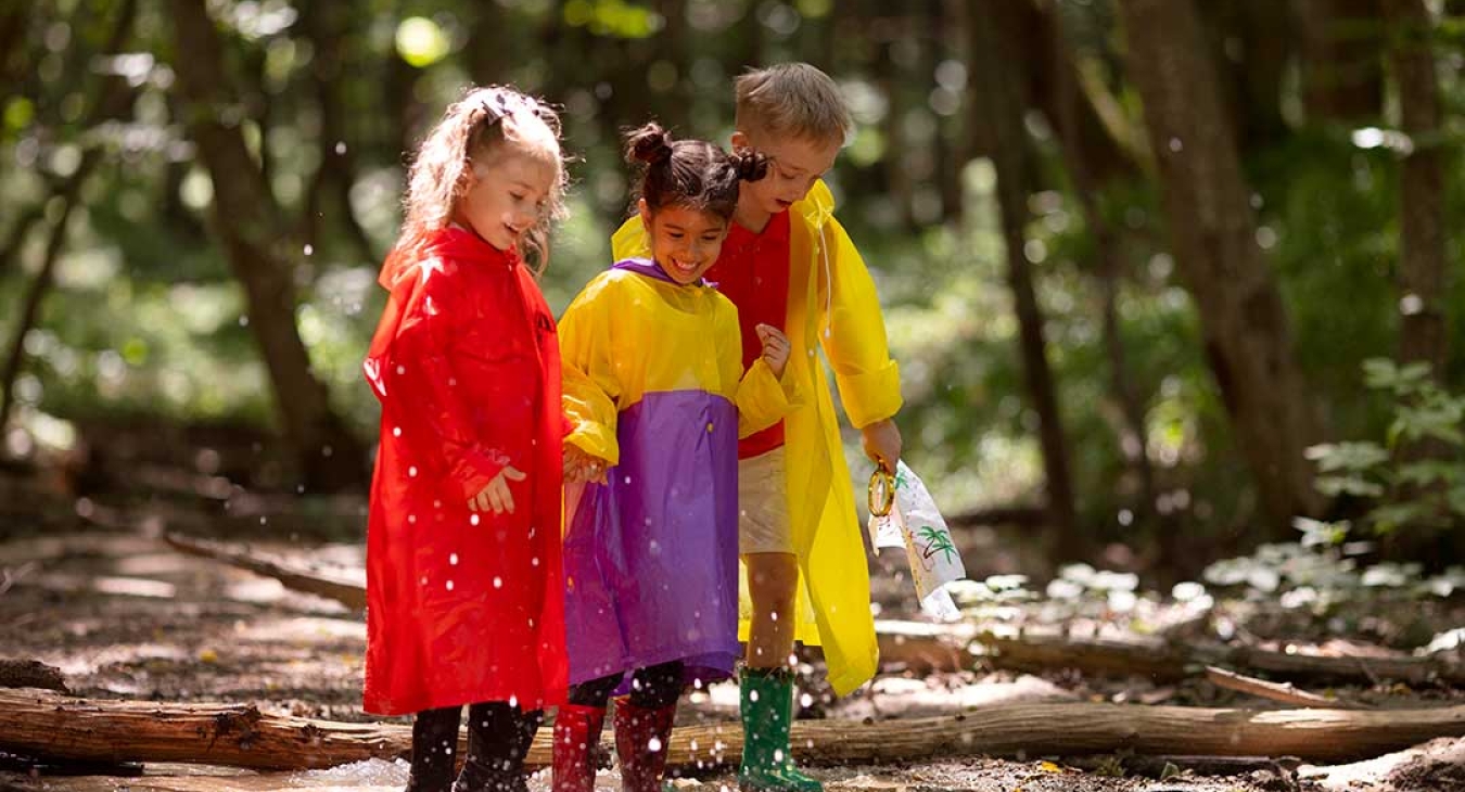 children playing in a puddle