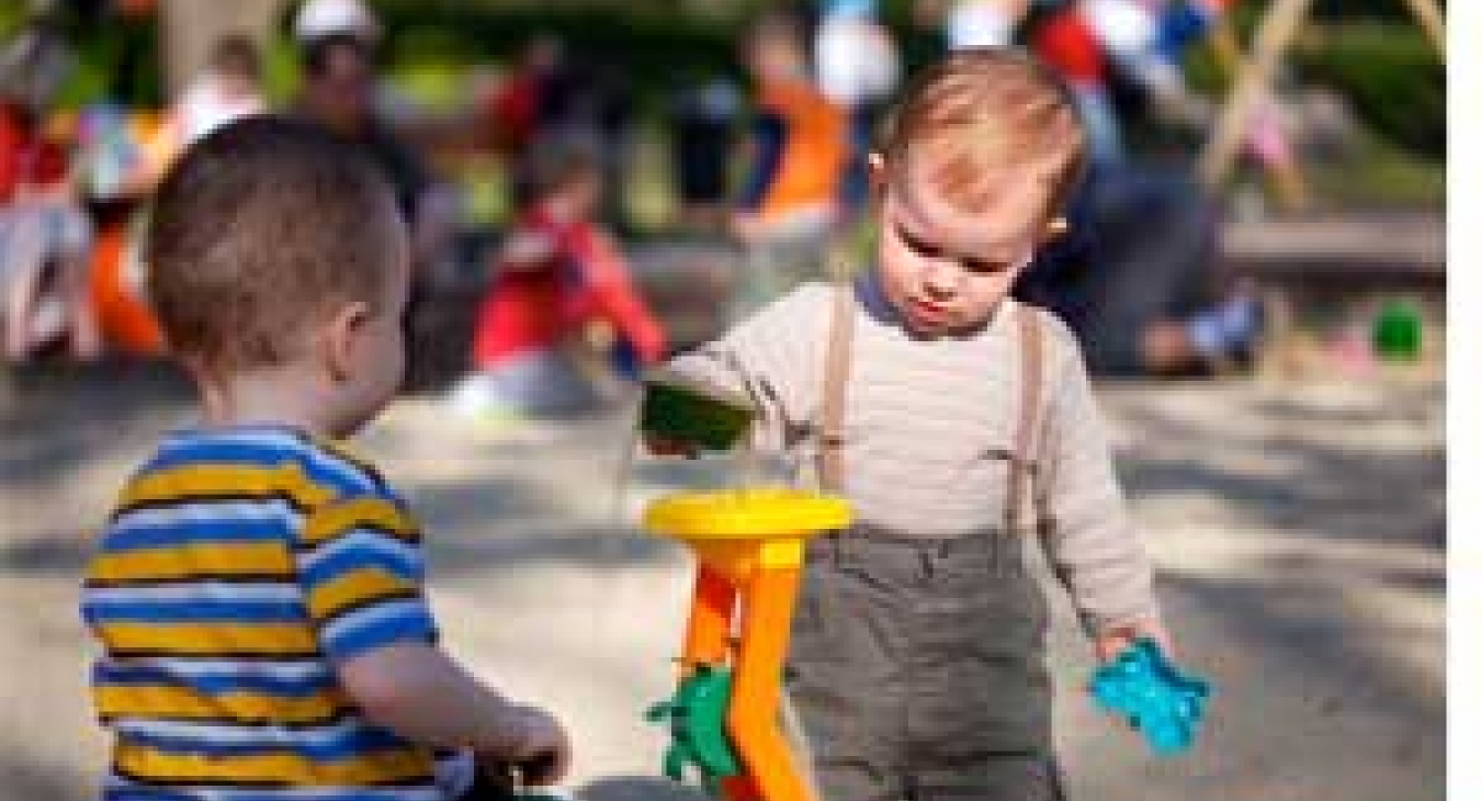 Babies playing with sand