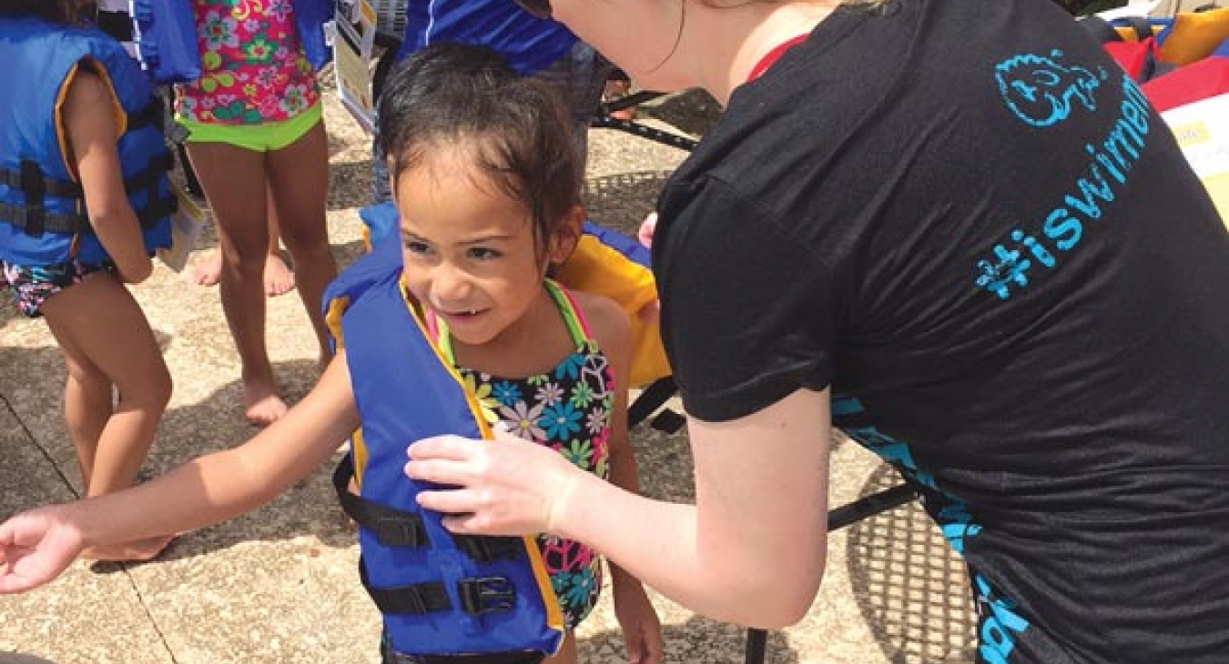 Child playing in the water