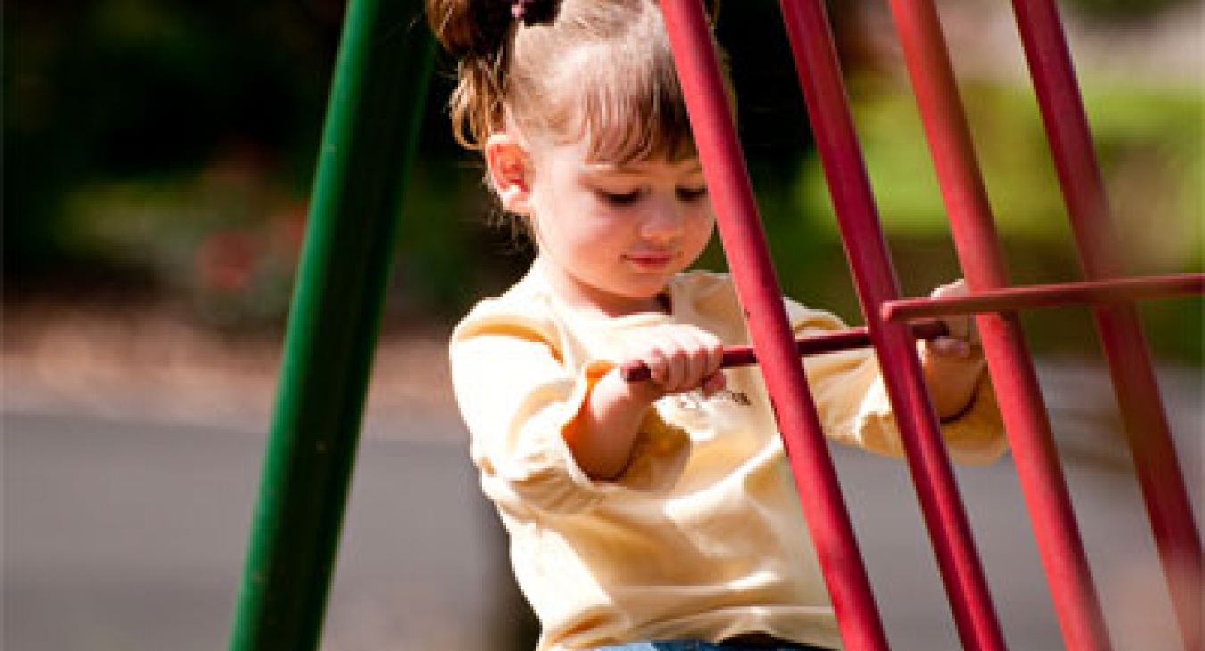 Girl on a play structure