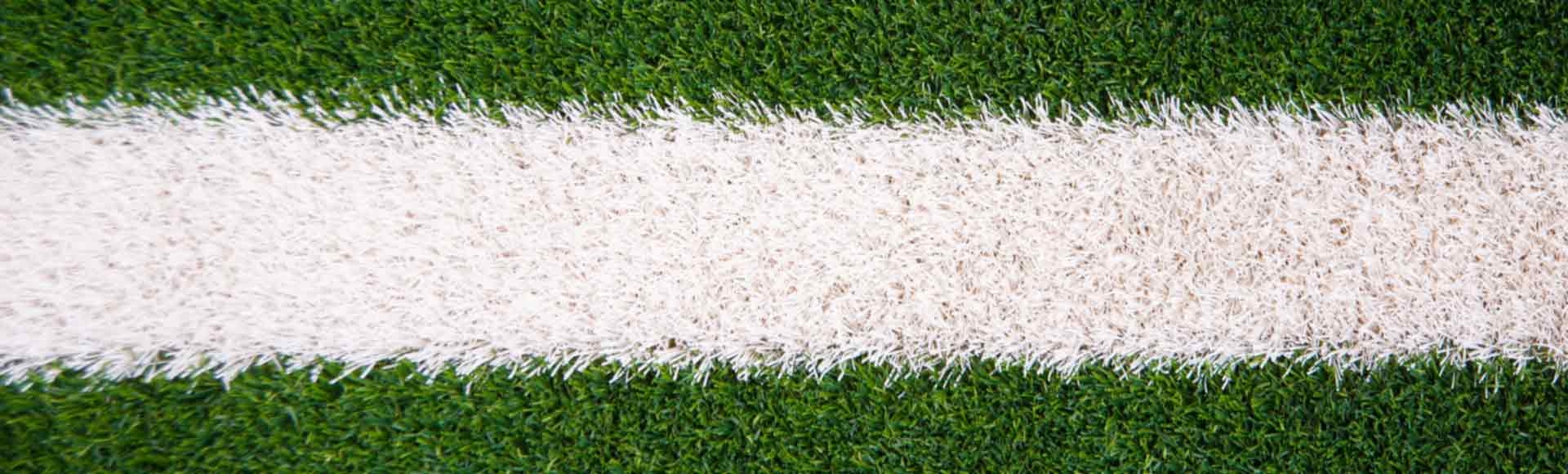 Turf Playing Field vs Playground Surfacing