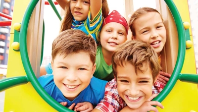 Kids playing on new playground