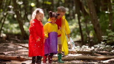 children playing in a puddle