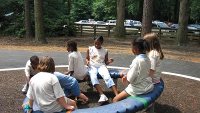 children playing on play equipment